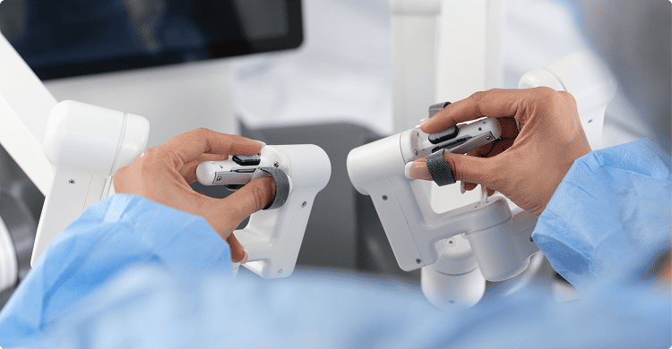 Surgeon operating the robotic console